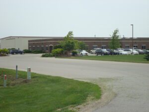 Lot of cars parked in front of the building